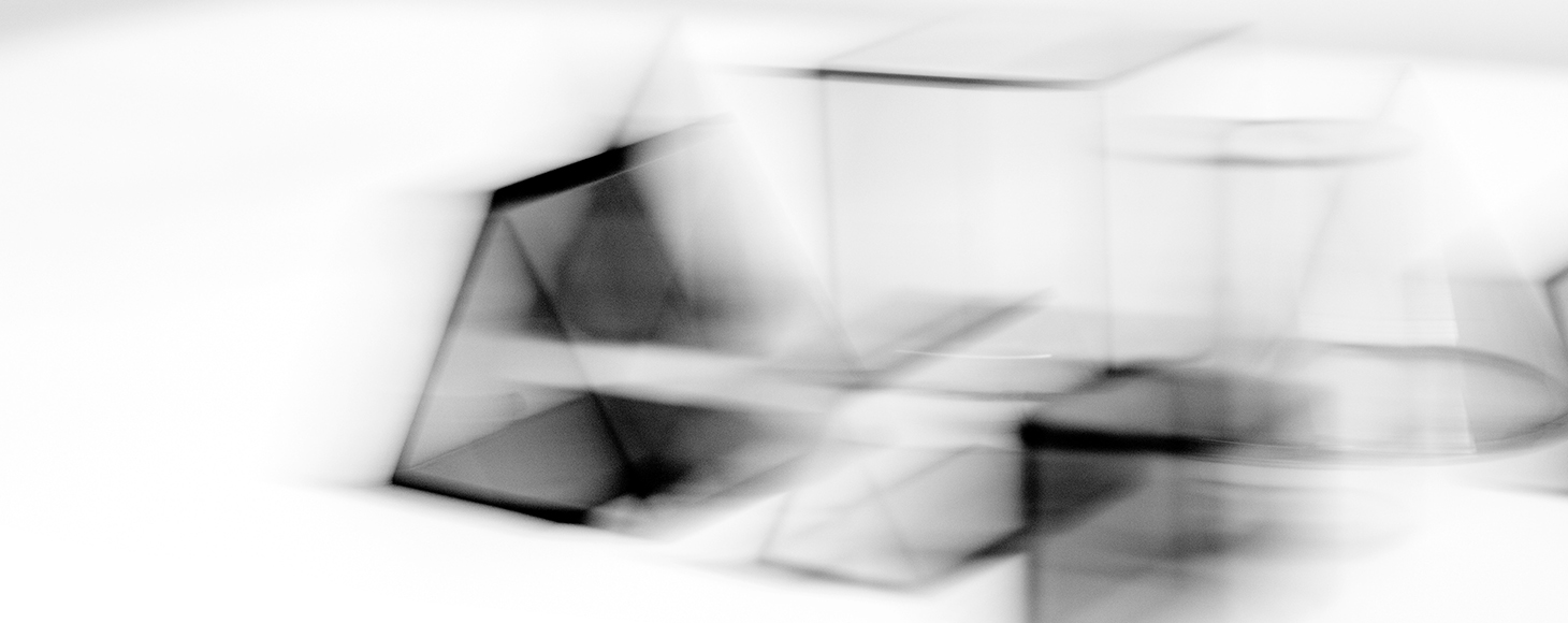 Collection of glass objects in a black and white image