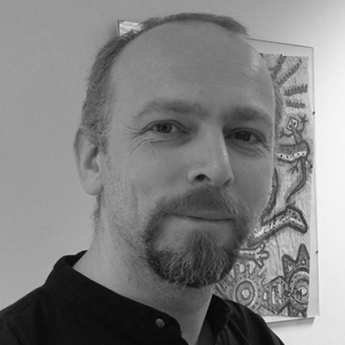 Black and white portrait of Dr Adam Drazin image